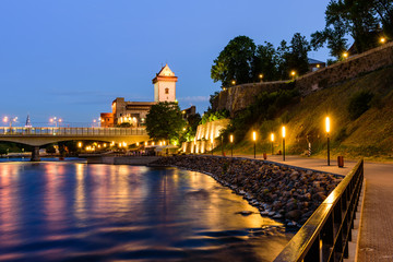 Beautiful night view of Narva Castle with tall Herman's tower, the monument and popular tourist attraction, Narva, Estonia