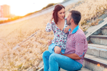 Fototapeta premium Portrait of young couple in love, outdoors.
