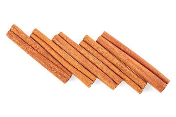 Cinnamon sticks on white background. Top view.