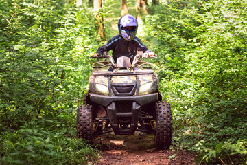 A trip on the ATV on the red road.