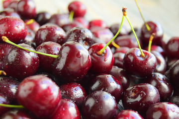    Sweet cherry fresh ripened. Drops of water are on sweet cherry. Сloseup