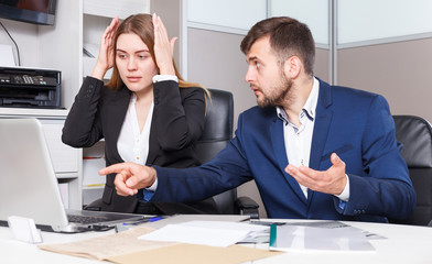 Frustrated female and male sales managers