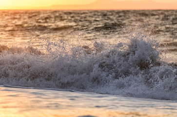 Sunset and stormy sea near Rethymno town on the island of Crete. Greece