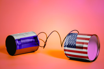 tin can phone with USA and Russian Flags.communication concept