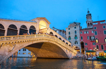 Fototapeta na wymiar Famous Rialto Bridge in Venice / Illumination at night