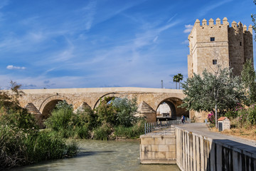 Fototapeta premium View of Calahorra Tower. Tower of Calahorra - fortress of Islamic origin conceived as an entrance and protection of the Roman Bridge of Cordoba across Guadalquivir River. Cordoba, Andalusia, Spain.