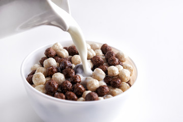 Chocolate cereal balls and milk