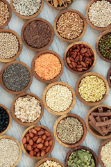 Dried macrobiotic super food  with legumes, seeds, nuts, cereal, grains, vegetables & whole wheat pasta with foods high in protein, omega 3, anthocyanins, antioxidants, minerals &  vitamins. Top View.