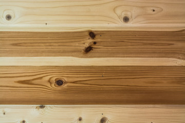 The natural color of unpainted wooden boards