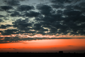 Red sunset and textured clouds