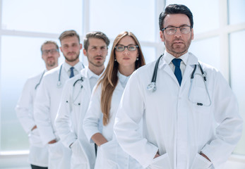 portrait of doctors standing in a row in the hospital