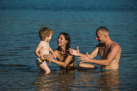 Summer vacation of happy family. summer rest of happy family in sea water.