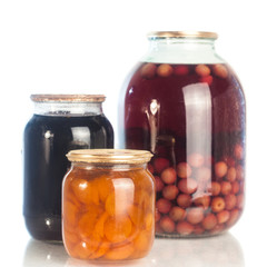 collection set of canned vegetables in glass jars isolated on white background