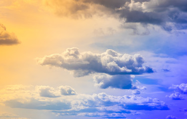 Storm clouds, dramatic sky, yellow and blue color scheme