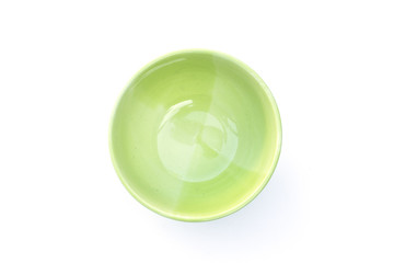 Green plate isolated on white background.