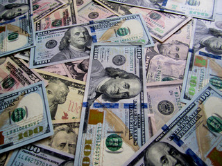 close up view of cash money dollars bills in amount