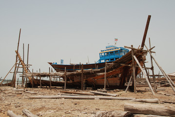 Fototapeta premium Shipyard of traditional Dhow boats on Iranian Qeshm Island