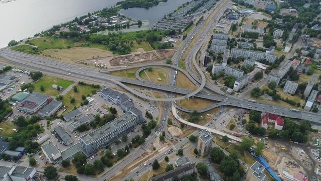 Bridges Viaduct drone timelapse of Riga City cars traffic in hypperlapse motion flight with buildings and driving vehicles