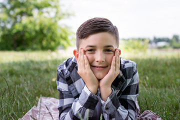 Boy with nice smile having fun outside