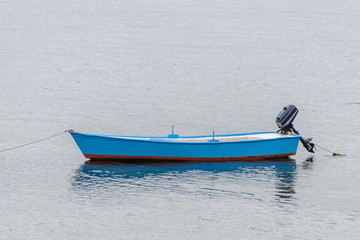 wooden fishing boat anchored