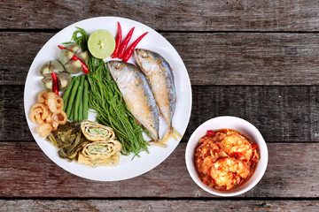 Fresh shrimp chili dip served with side dish.