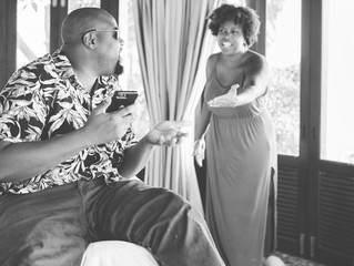 Wife getting angry at her husband for spending too much time on the phone