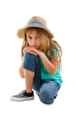 Depressed solemn little girl staring at the camera