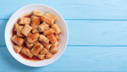 Homemade potatoes gnocchi with tomato sauce .