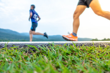 Chiang Mai, Thailand - June 17th, 2018 : Feet of Chiang Mai people running in marathon running race...