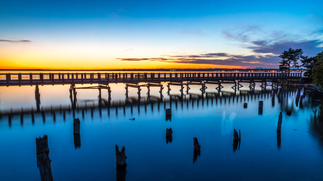 Long exposure of the sunset over the S Bay Trail, at the Boulvevard Park, Bellingham, Whatcom County. USA.