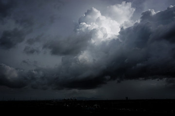 Rain big clouds storm over Industrial