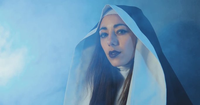 Bad nun looks at the camera sexually