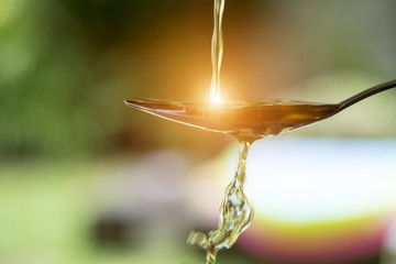 Extra virgin olive oil pouring