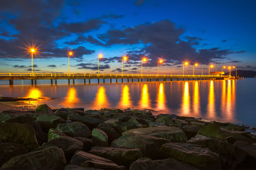 The rock armour by the boat slipway and a concrete jetty at dusk in Kota Kinabalu, Sabah, Malaysia