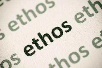 word ethos  printed on paper macro