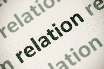 word relation printed on paper macro