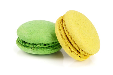 yellow and green macaroon isolated on white background closeup