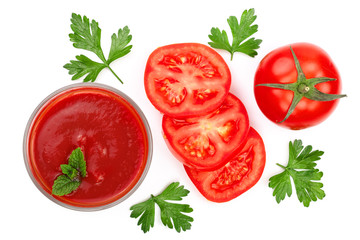 Tomato juice in glass and tomatoes with parsley leaves isolated on white background. Top view. Flat lay