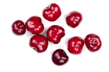Sweet red cherries isolated on white background. Top view. Flat lay pattern
