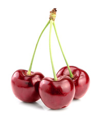 Sweet red cherries isolated on white background macro.