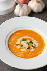 pumpkin soup with spices on table