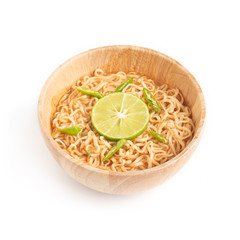 Wooden bowl of noodles isolated on white background