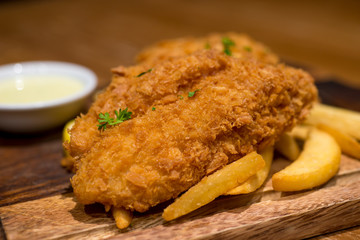 Fish and chips is a hot dish of English origin consisting of fried battered fish and hot potato chips