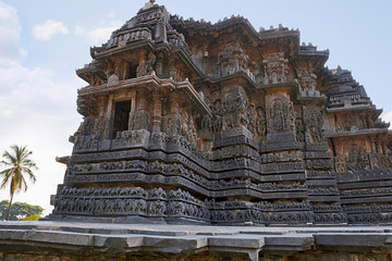 Naklejka premium Facade and ornate wall panel relief, Hoysaleshwara temple, Halebidu, Karnataka View from South West.