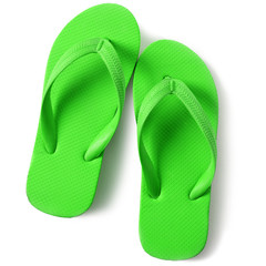 Bright green flip flop sandals isolated on white background