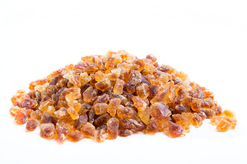Brown sugar gravel crystals On a white background
