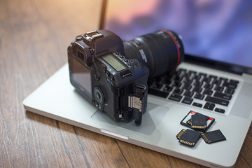 Digital photography workstation, Laptop computer and display.
