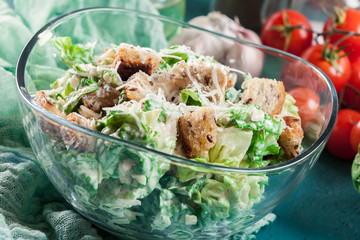 Healthy caesar salad with cheese and croutons
