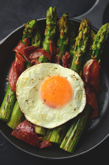 Grilled asparagus with prosciutto and fried egg