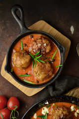 Meatballs in sweet and sour tomato sauce. 